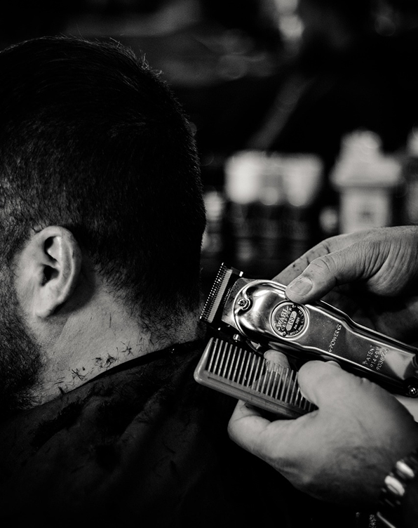 Close up of a man getting a hair cut