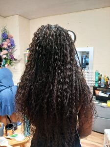 An african girl with boho brides done at Tete Hazel