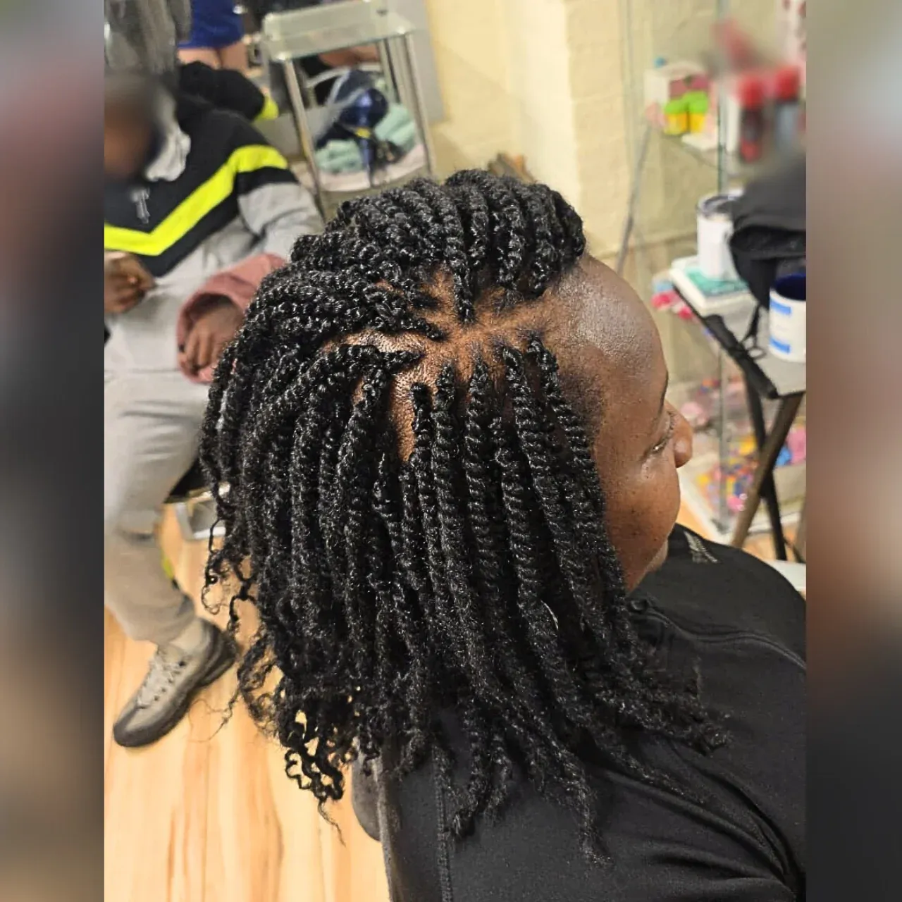An African woman with a twists hairstyle at Tete Hazel